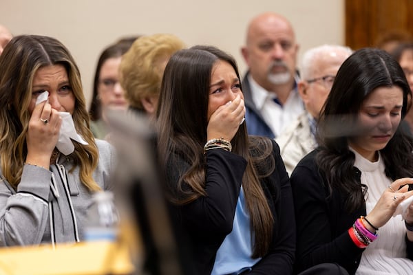 From left, Connolly Huth, Lauren Phillips and Sofia Magana become emotional during the trial for Jose Ibarra at the Athens-Clarke County Superior Court on Tuesday, Nov. 19, 2024, in Athens, Ga. (Arvin Temkar/Atlanta Journal-Constitution via AP, Pool)