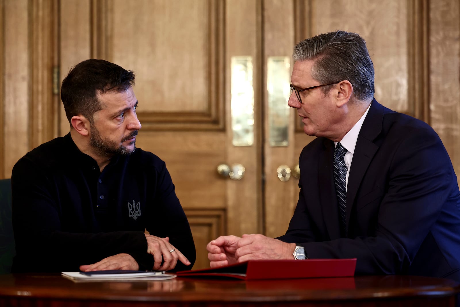 Britain's Prime Minister Keir Starmer, right, and Ukraine's President Volodymyr Zelenskyy speak during a bilateral meeting inside 10 Downing Street, in London, Thursday Oct. 10, 2024. (Henry Nicholls/Pool Photo via AP)