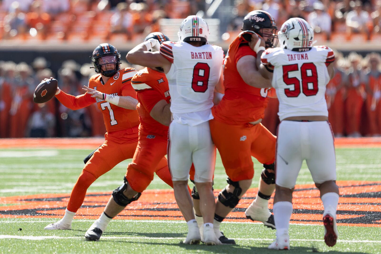 Oklahoma State quarterback Alan Bowman (7) passes the ball in the first half of an NCAA college football game against Utah, Saturday, Sept. 21, 2024, in Stillwater, Okla. (AP Photo/Mitch Alcala)