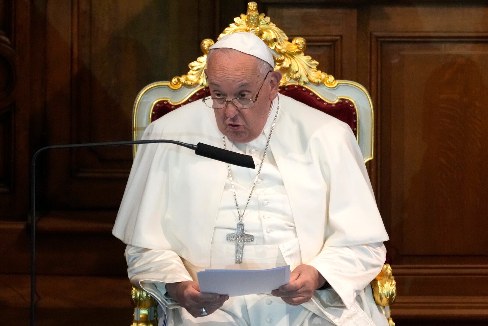 Pope Francis delivers his speech during his meeting with the professors in the Promotiezaal of the Catholic University of Leuven, Belgium, Friday, Sept. 27, 2024. (AP Photo/Andrew Medichini)