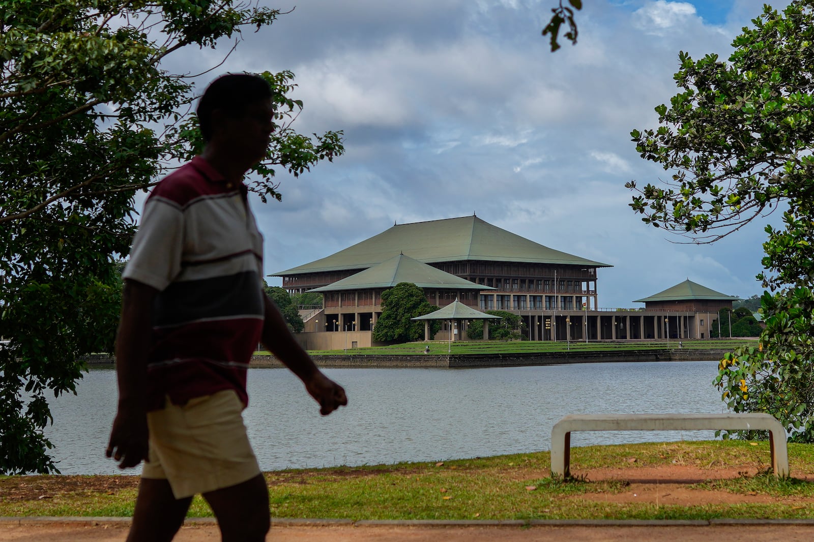 A man walks outside parliamentary complex in Colombo, Sri Lanka, Wednesday, Sept. 25, 2024. (AP Photo/Eranga Jayawardena)