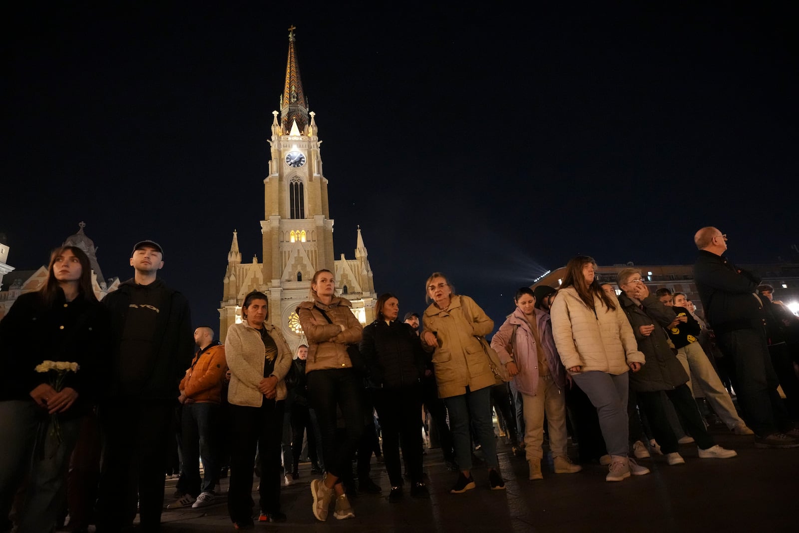 People light candles for the victims after an outdoor roof collapsed at a train station in Novi Sad, Serbia, Friday, Nov. 1, 2024. (AP Photo/Darko Vojinovic)