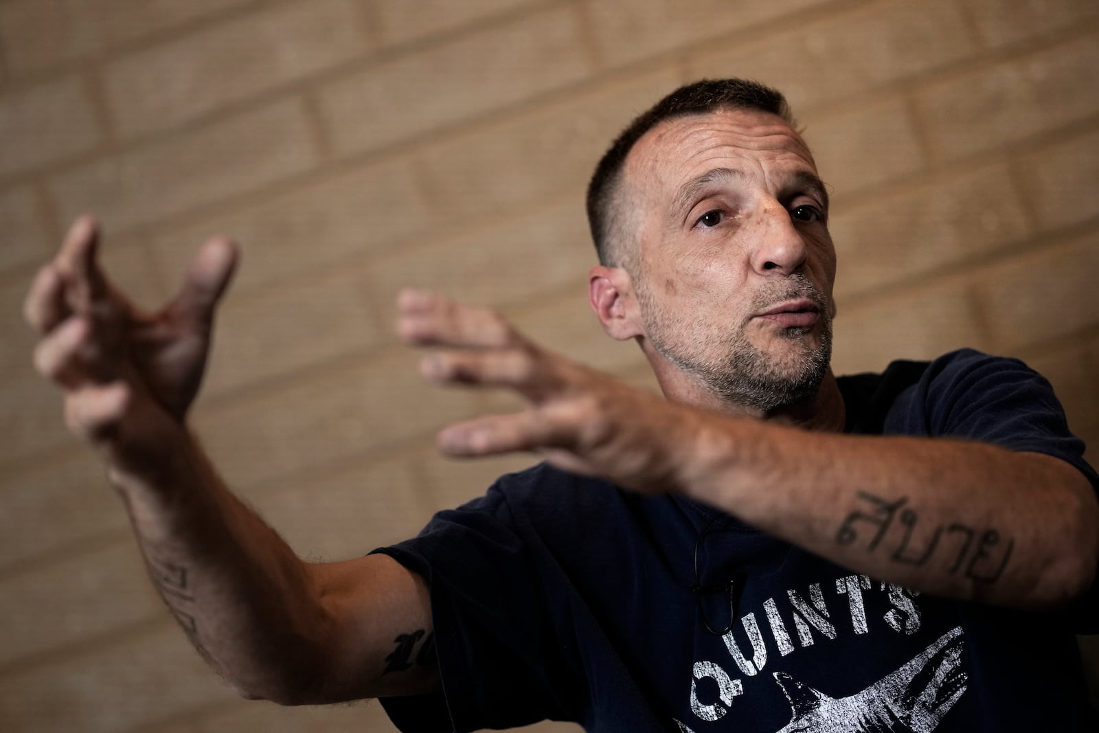 Mathieu Kassovitz speaks during an interview with Associated Press, in Tremblay-en-France, Tuesday, Sept. 17, 2024. (AP Photo/Christophe Ena)