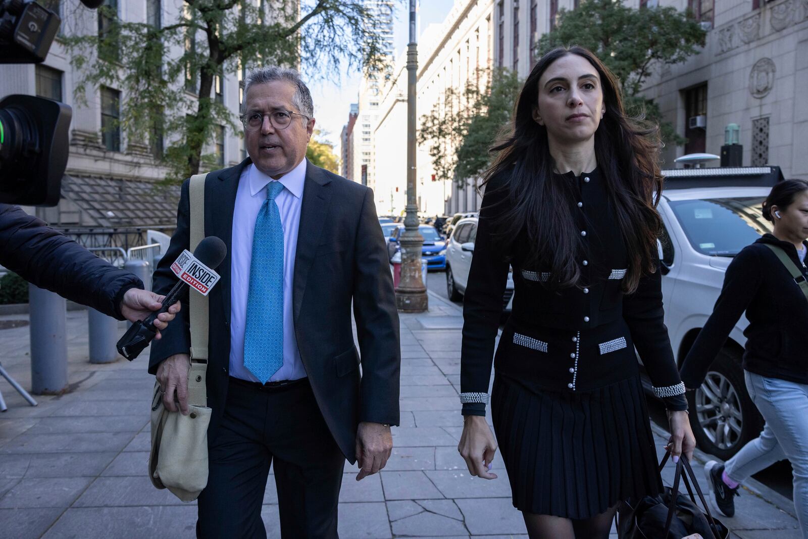 Attorney Marc Agnifilo, left, and Teny Geragos, right, for Sean "Diddy Combs, arrive at Manhattan federal court, Thursday, Oct. 10 2024, in New York. (AP Photo/Yuki Iwamura)