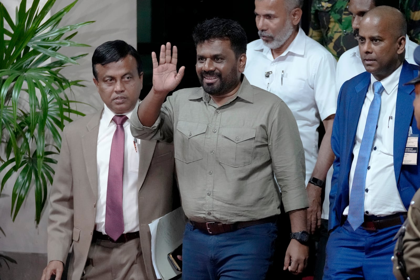 Marxist lawmaker Anura Kumara Dissanayake waves as he departs the election commission office after winning the presidential election in Colombo, Sri Lanka, Sunday, Sept. 22, 2024. (AP Photo/Eranga Jayawardena)