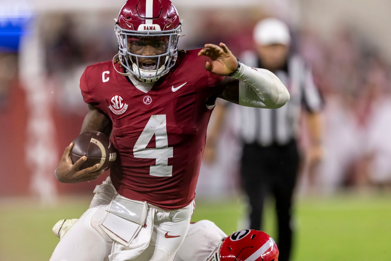 Alabama quarterback Jalen Milroe runs the ball for a touchdown against Georgia during the first half of an NCAA college football game, Saturday, Sept. 28, 2024, in Tuscaloosa, Ala. (AP Photo/Vasha Hunt)