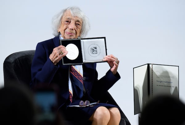 FILE - Margot Friedlander shows the Mevlude Genc Medal after it was awarded to her, at the Bode Museum in Berlin, Tuesday June 4, 2024. (Bernd von Jutrczenka/dpa via AP, File)