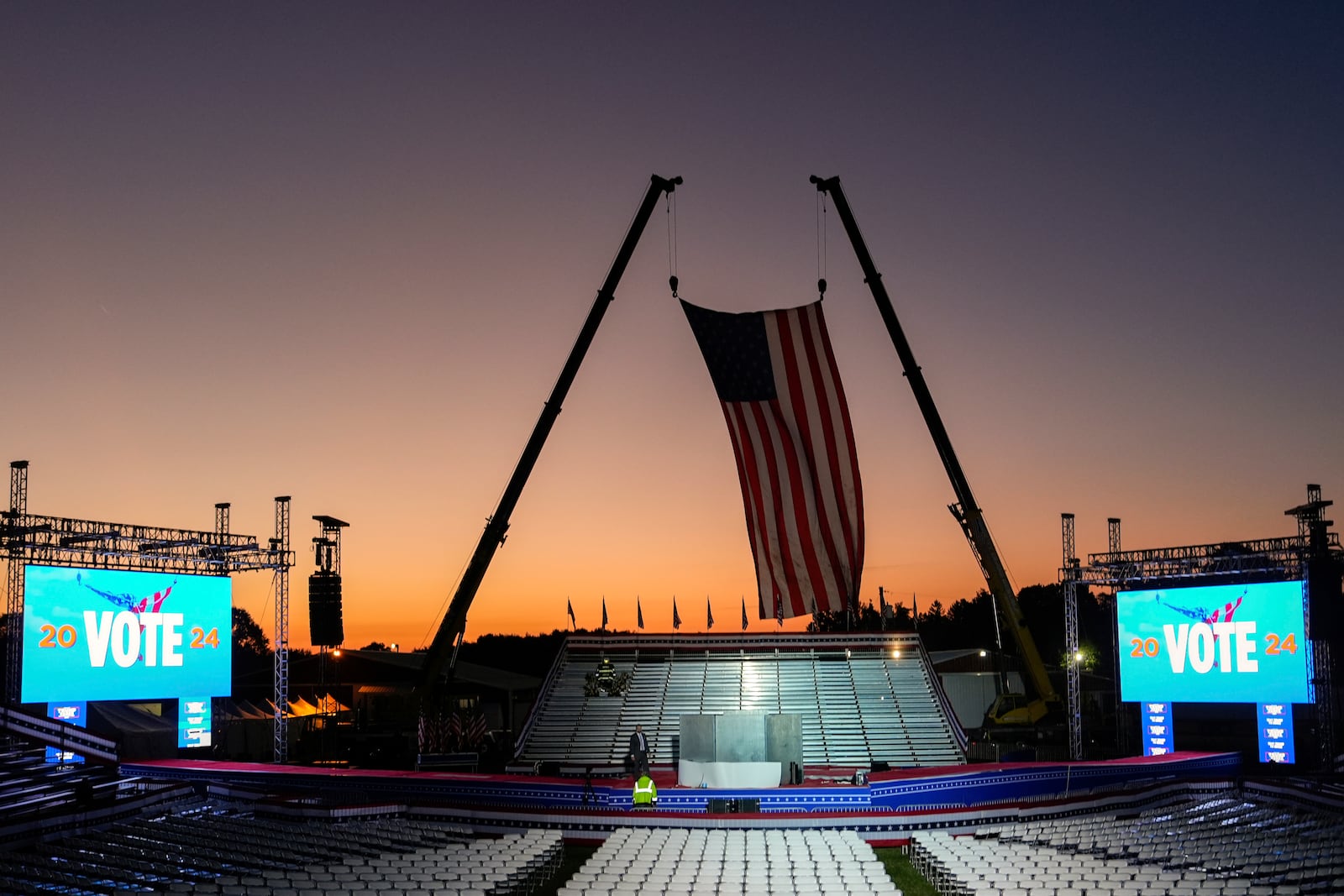 The campaign rally site is seen near sunrise before Republican presidential nominee former President Donald Trump speaks at the Butler Farm Show, Saturday, Oct. 5, 2024, in Butler, Pa. (AP Photo/Julia Demaree Nikhinson)