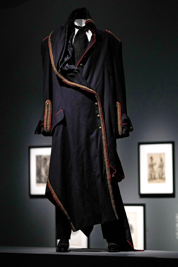 A coat designed by John Galliano for the House of Dior and worn by André Leon Talley is displayed at the Metropolitan Museum of Art's Costume Institute exhibition, "Superfine: Tailoring Black Style," on Saturday, May 3, 2025, in New York. (Photo by Charles Sykes/Invision/AP)