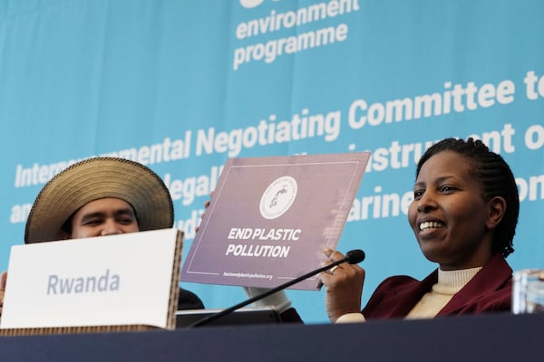 Juliet Kabera, right, director general of the Rwanda Environment Management Authority and Rwanda's lead negotiator to the INC, speaks during a press conference as Juan Carlos Monterrey, head of Panama's delegation, watches during a press conference at the fifth session of the Intergovernmental Negotiating Committee on Plastic Pollution in Busan, South Korea, Sunday, Dec. 1, 2024. (AP Photo/Ahn Young-joon)