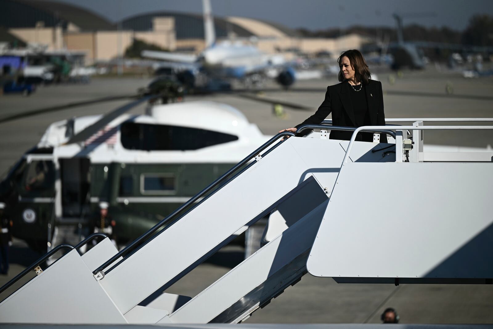 Democratic presidential nominee Vice President Kamala Harris boards Air Force Two, Wednesday, Oct. 30, 2024, at Joint Base Andrews, Md. (Brendan Smialowski/Pool via AP)