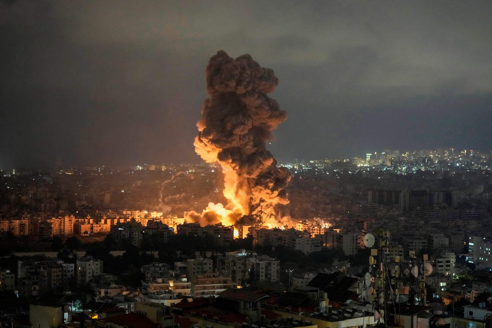 Flames and smoke rise from an Israeli airstrike in Dahiyeh, Beirut, Lebanon, Sunday, Oct. 6, 2024. (AP Photo/Bilal Hussein)