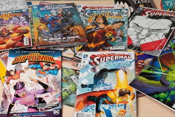 Comic books are displayed in Gene Yang's home Tuesday, April 1, 2025, in San Jose, Calif. (AP Photo/Tony Avelar)
