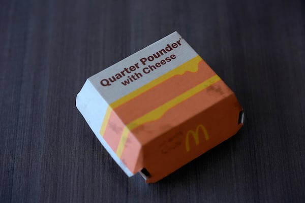 Pictured is a McDonald's Quarter Pounder sandwich box purchased Wednesday, Oct. 23, 2024, in Chicago. (AP Photo/Charles Rex Arbogast)