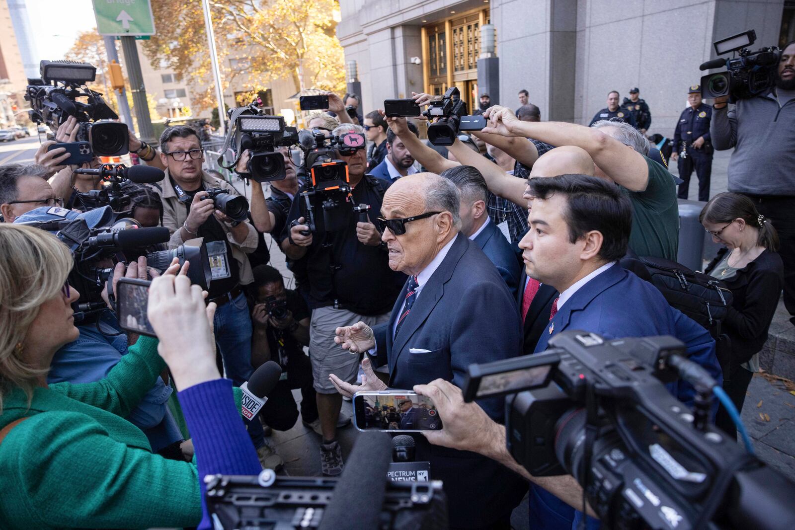 Former New York City Mayor Rudy Giuliani arrives at the court to explain to a federal judge why he hasn't surrendered his valuables as part of a $148 million defamation judgment, in New York, Thursday, Nov. 7, 2024. (AP Photo/Yuki Iwamura)