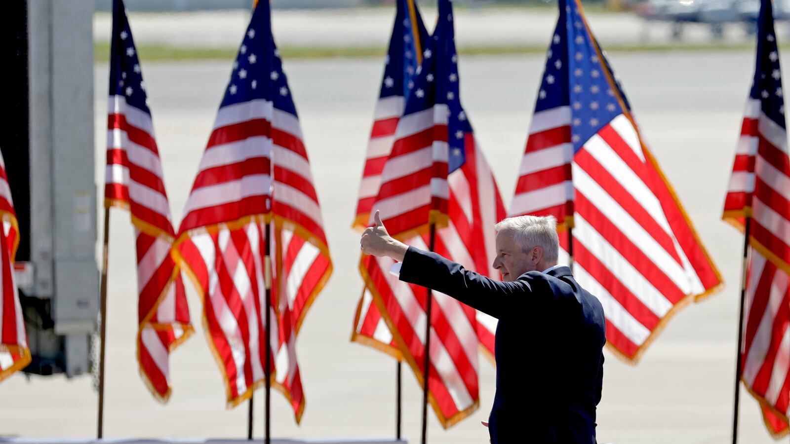 Republican National Committee chair Michael Whatley gives a thumbs up after addressing the crowd before Republican presidential nominee former President Donald Trump speaks at a campaign event at Wilmington International Airport in Wilmington, N.C., Saturday, Sept. 21, 2024. (AP Photo/Chris Seward)