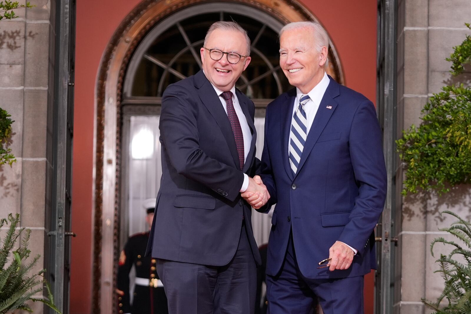 President Joe Biden greets Australia's Prime Minister Anthony Albanese at the Quad leaders summit at Archmere Academy in Claymont, Del., Saturday, Sept. 21, 2024. (AP Photo/Mark Schiefelbein)