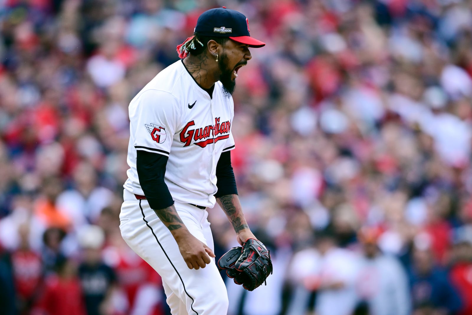 Cleveland Guardians' Emmanuel Clase reacts after striking out Detroit Tigers' Kerry Carpenter to end the eighth inning during Game 5 of baseball's American League Division Series, Saturday, Oct. 12, 2024, in Cleveland. (AP Photo/David Dermer)