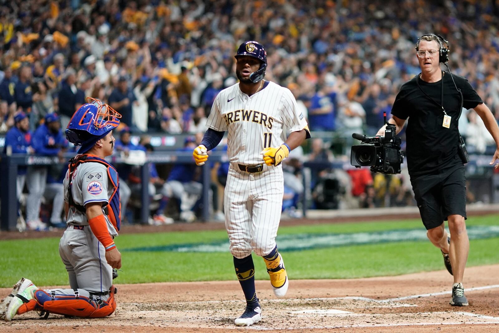 Milwaukee Brewers' Jackson Chourio hits a home run during the eighth inning of Game 2 of a National League wild card baseball game against the New York Mets Wednesday, Oct. 2, 2024, in Milwaukee. (AP Photo/Morry Gash)