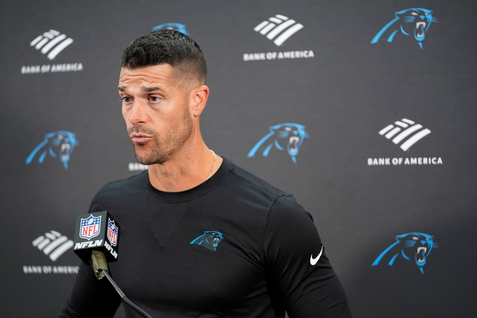 Carolina Panthers head coach Dave Canales speaks during a news conference after an NFL football game against the Washington Commanders, Sunday, Oct. 20, 2024, in Landover, Md. The Commanders 40-7. (AP Photo/Stephanie Scarbrough)