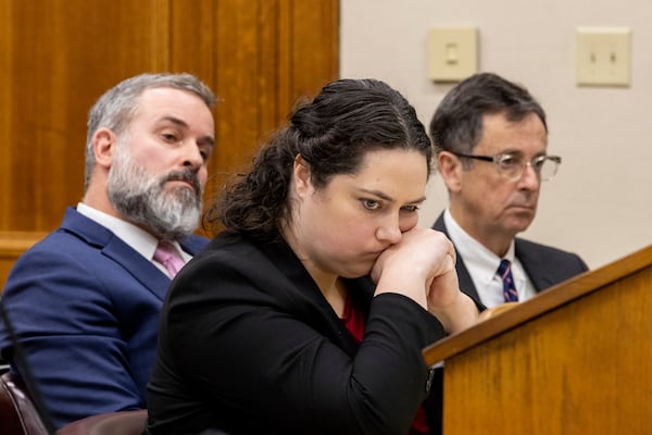 Defense attorneys, from left, Dustin Kirby, Kaitlyn Beck and John Donnelly listen during defendant Jose Ibarra's trial at the Athens-Clarke County Superior Court, Tuesday, Nov. 19, 2024, in Athens, Ga. (Arvin Temkar/Atlanta Journal-Constitution via AP, Pool)