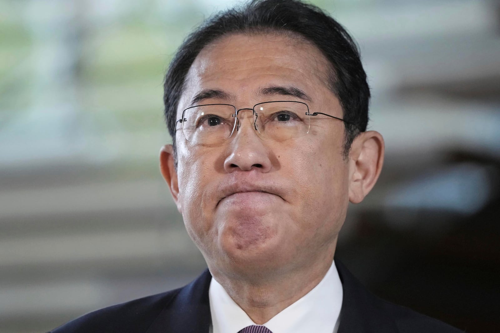 FILE - Japan's Prime Minister Fumio Kishida speaks to reporters at his office in Tokyo, on April 30, 2024 as he acknowledged that his governing party's major defeat in the weekend's by-elections was due to a slush fund scandal. (Kyodo News via AP, File)