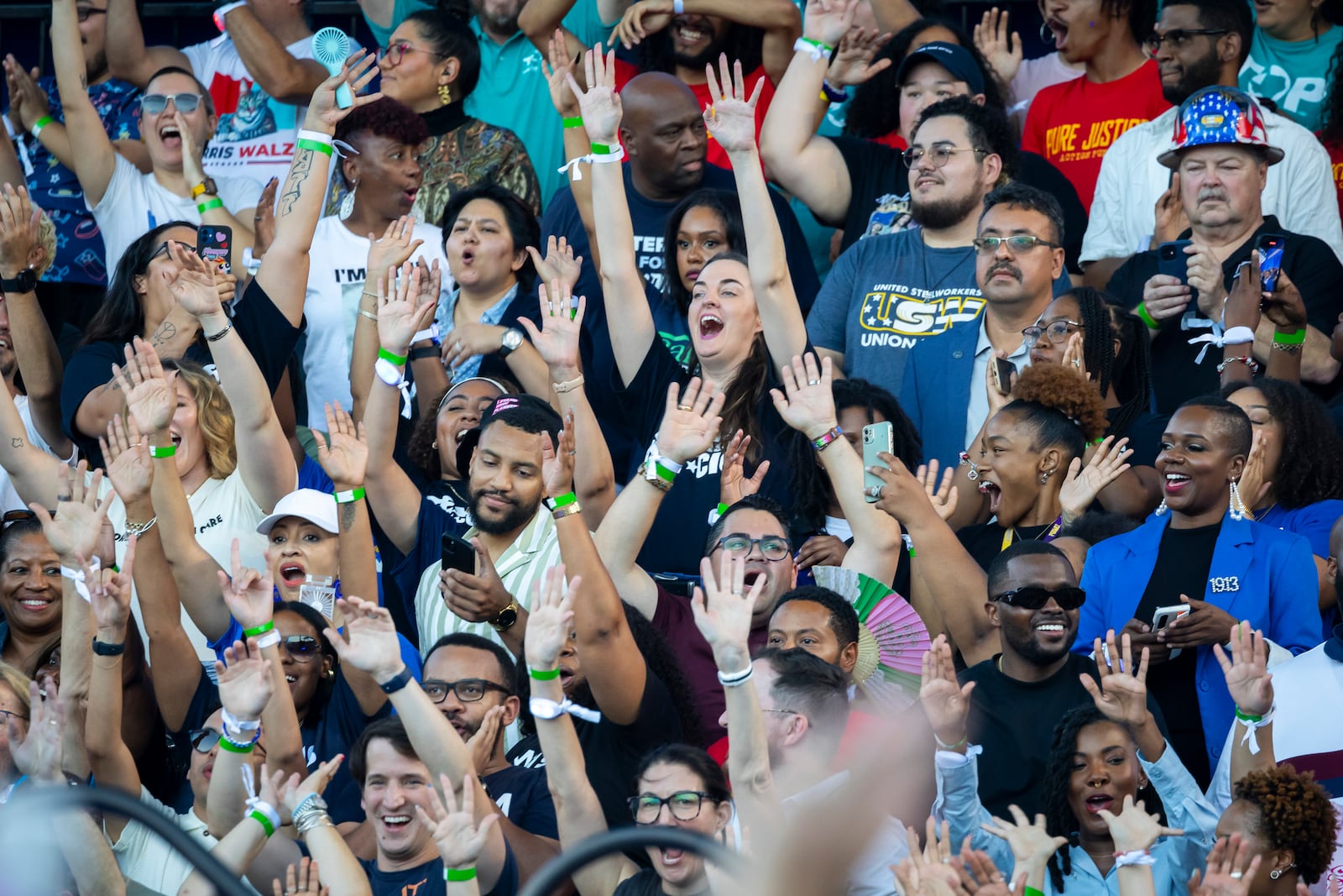 Attendees cheer during a rally for Democratic presidential nominee Vice President Kamala Harris on Friday, Oct. 25, 2024, in Houston. (AP Photo/Annie Mulligan)