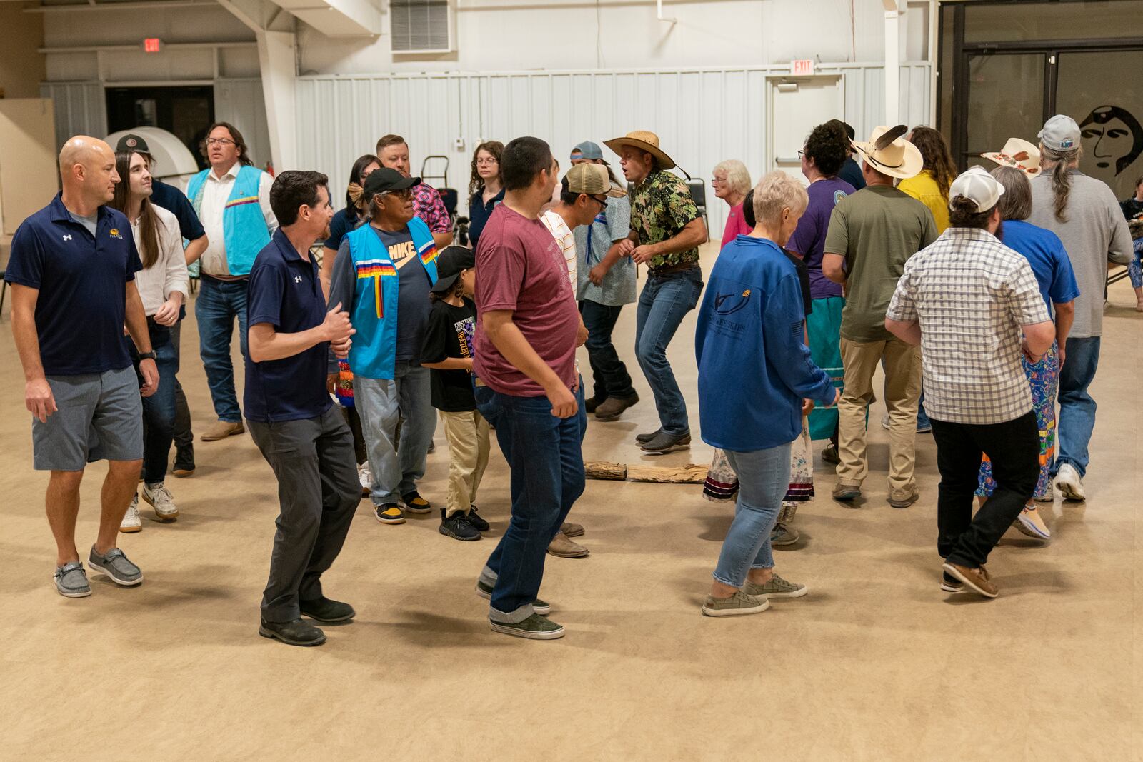 Shawnee Tribe members and guests from Firaxis participate in a stomp dance on Friday, September 20, 2024 in Miami, Okla.. (AP Photo/Nick Oxford)