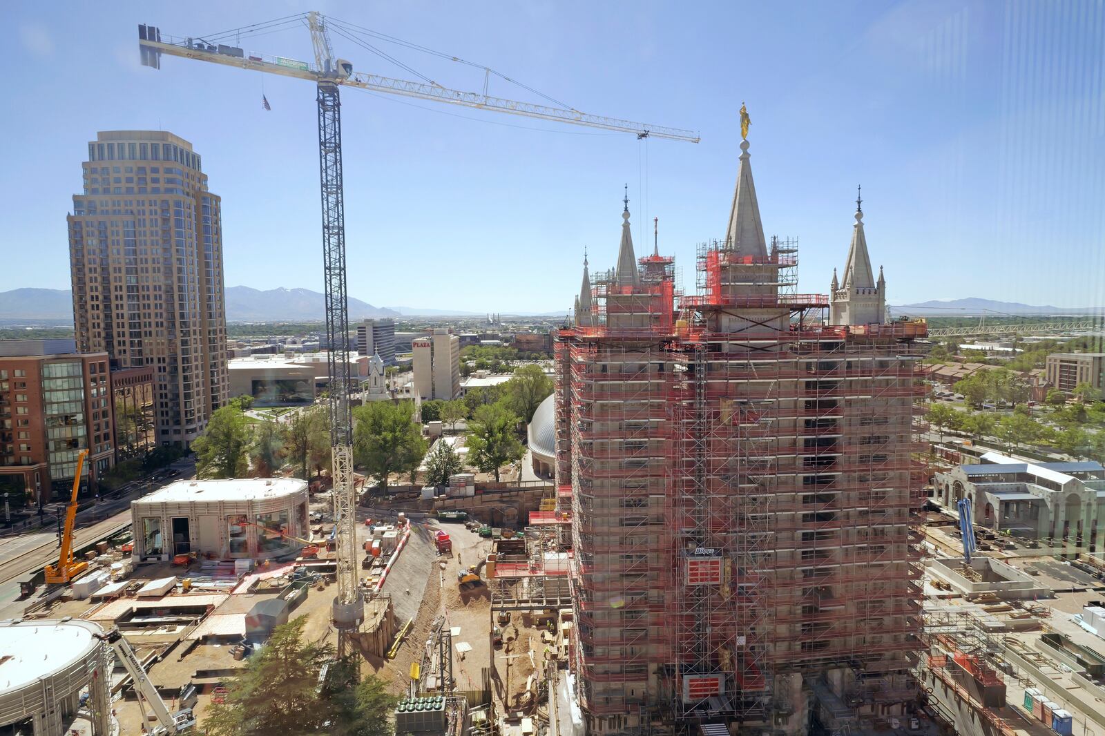 A view of the ongoing Temple Square renovation project, showing the Salt Lake Temple enveloped in scaffolding, is seen on June 4, 2024, in Salt Lake City. (AP Photo/Rick Bowmer)