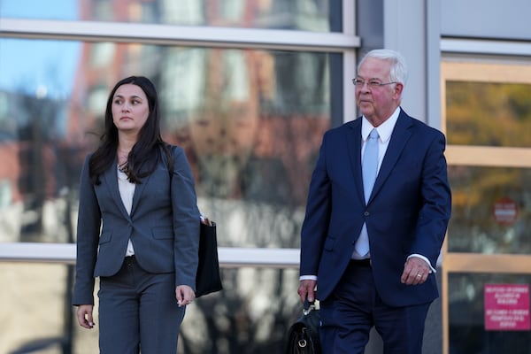 Megan Coleman and Robert Bonsib, attorneys representing Eduardo Valdivia, an FBI agent accused of sexually assaulting two women, leave the Montgomery County District Court in Rockville, Md., following a bond hearing for Valdivia, Tuesday, Nov. 26, 2024. (AP Photo/Stephanie Scarbrough)