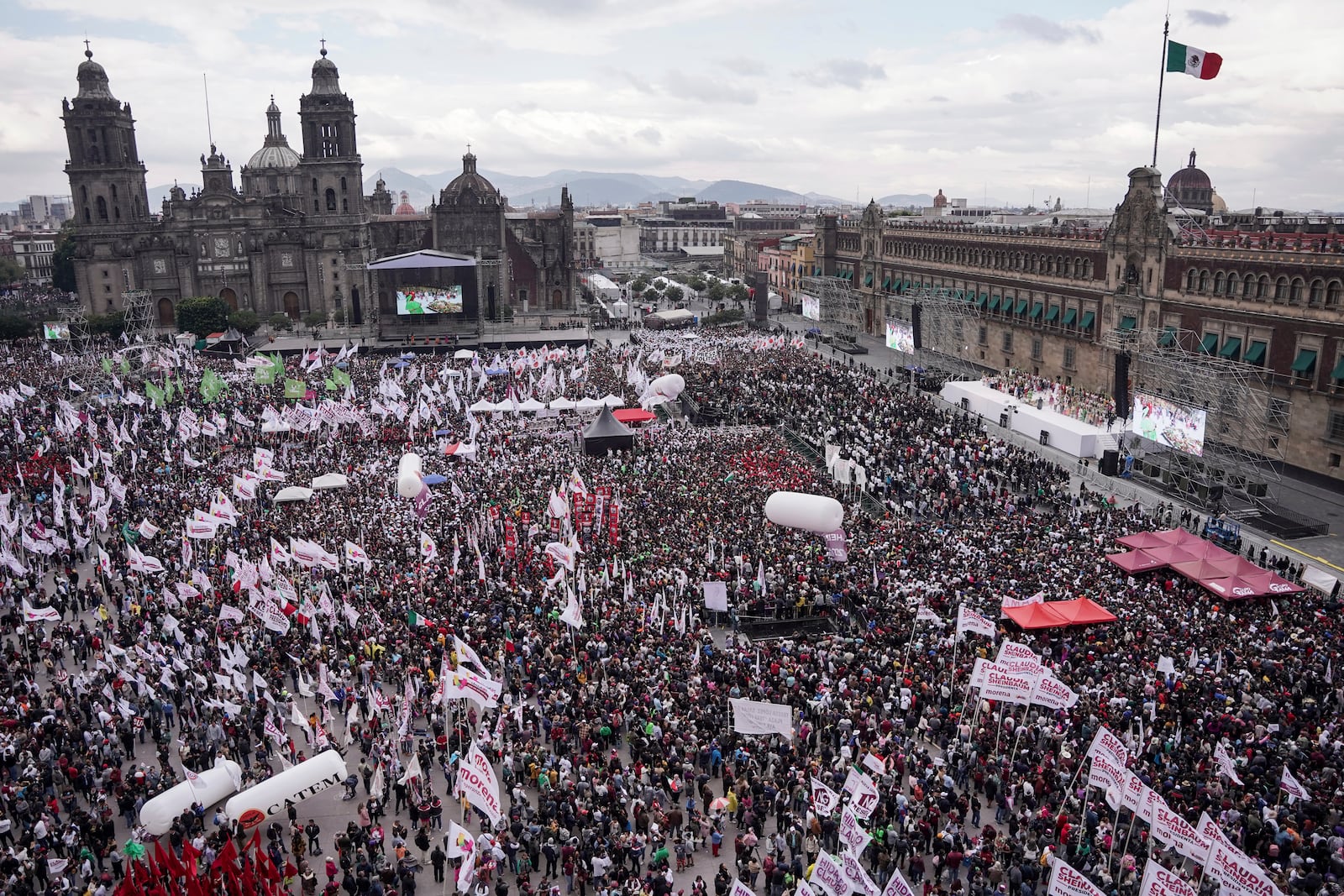 Supporters gather in the Zócalo, Mexico City's main square, during a rally of President Claudia Sheinbaum on her inauguration day, Tuesday, Oct. 1, 2024. (AP Photo/Aurea Del Rosario)