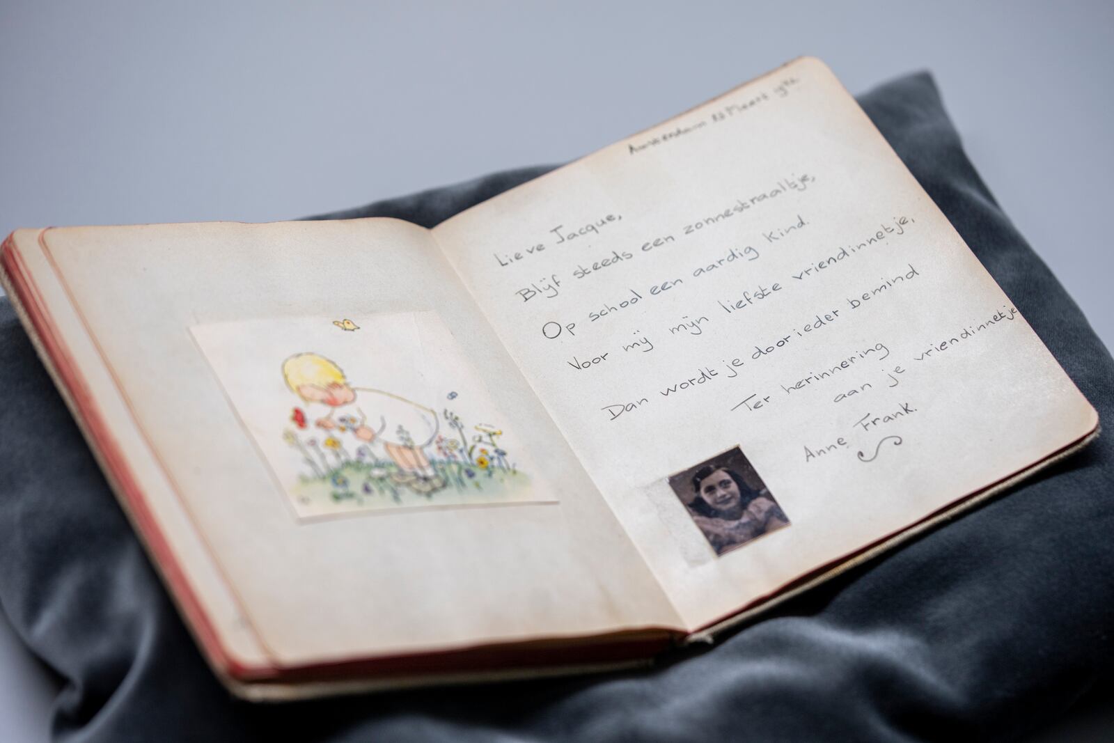 A friendship album with Anne Frank's writing is displayed in Amsterdam, Netherlands, Friday, Oct. 4, 2024, ahead of an exhibit in New York. (AP Photo/Peter Dejong)