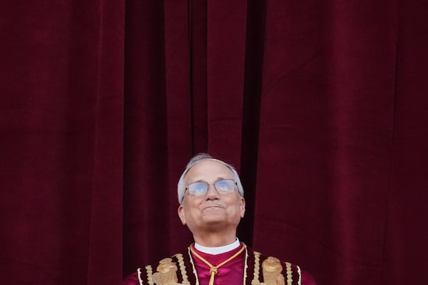 Newly elected Pope Leo XIV appears at the balcony of St. Peter's Basilica at the Vatican, Thursday, May 8, 2025. (AP Photo/Alessandra Tarantino)
