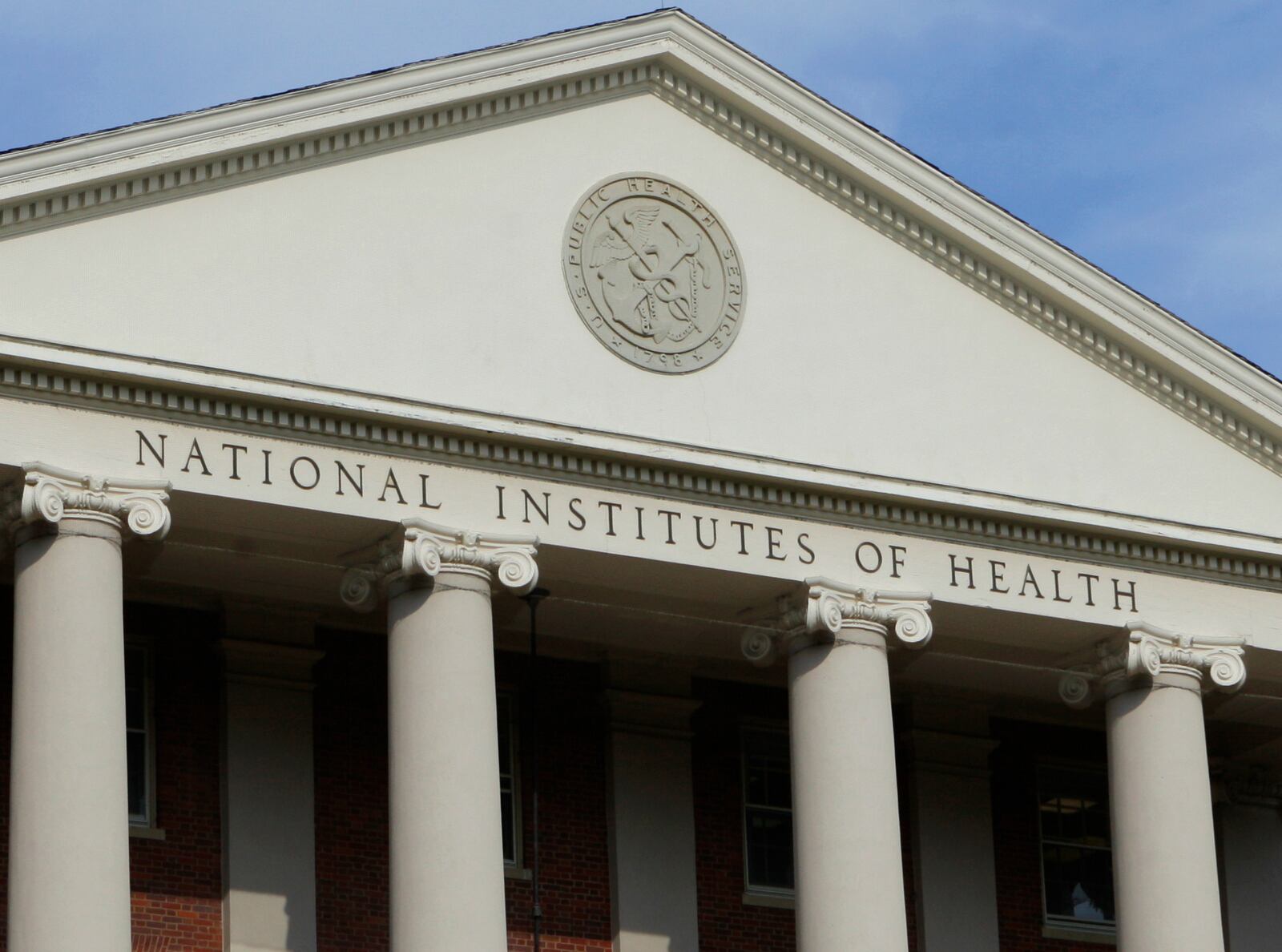 FILE - The administrative building of the National Institutes of Health is shown in Bethesda, Md., Aug. 17, 2009. (AP Photo/J. Scott Applewhite, File)