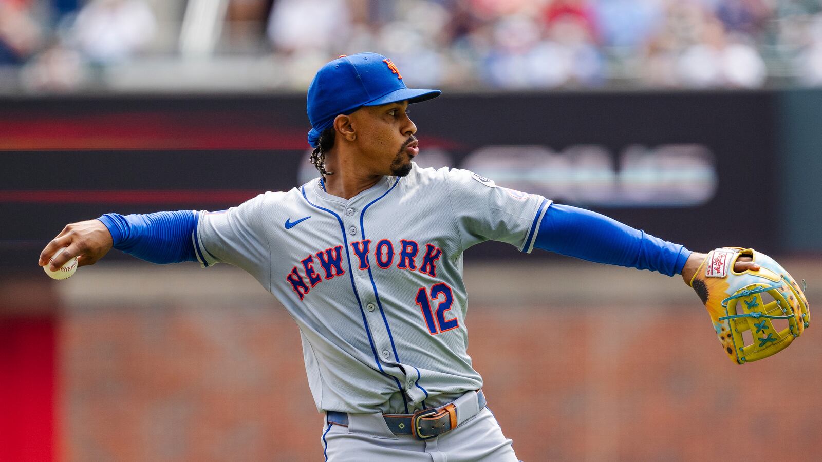 New York Mets shortstop Francisco Lindor throws to first base in the third inning of a baseball game against the New York Mets, Monday, Sept. 30, 2024, in Atlanta. (AP Photo/Jason Allen)