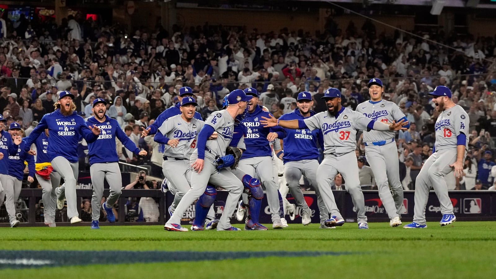 The Los Angeles Dodgers celebrate their win against the New York Yankees in Game 5 to win the baseball World Series, Wednesday, Oct. 30, 2024, in New York. (AP Photo/Godofredo A. Vásquez)