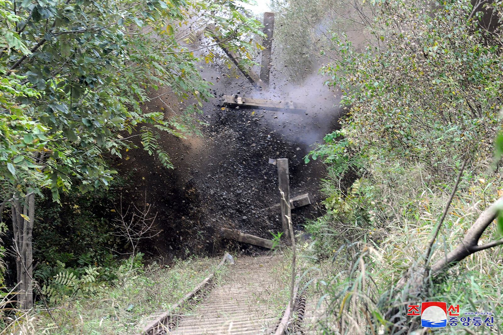 This photo provided by the North Korean government, shows a demolition of parts of the northern sections of unused road and rail links that once connected the country with the South, seen from North Korea Tuesday, Oct. 15, 2024. Independent journalists were not given access to cover the event depicted in this image distributed by the North Korean government. The content of this image is as provided and cannot be independently verified. Korean language watermark on image as provided by source reads: "KCNA" which is the abbreviation for Korean Central News Agency. (Korean Central News Agency/Korea News Service via AP)