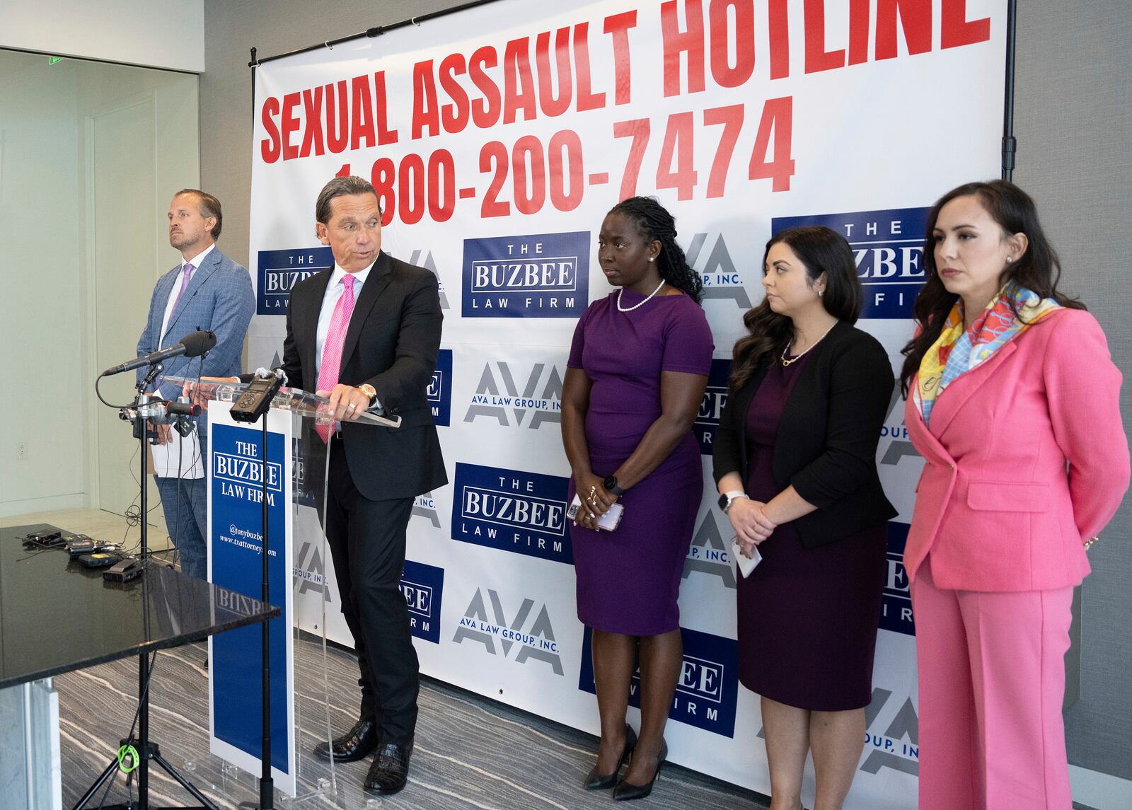 Houston lawyer Tony Buzbee, second from left, holds a news conference at his office announcing that he's representing 120 accusers who have come forward with sexual misconduct allegations against Sean “Diddy” Combs, the hip-hop mogul who is awaiting trial on sex trafficking charges, Tuesday, Oct. 1, 2024, in Houston. (Elizabeth Conley/Houston Chronicle via AP)