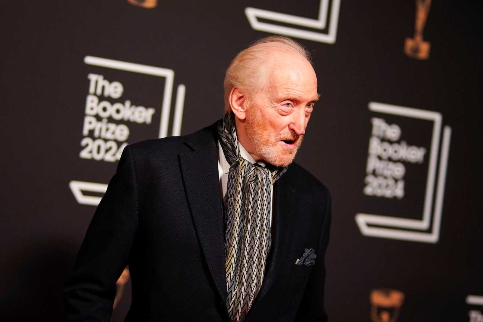 Charles Dance arrives at the Booker Prize award dinner in London, Tuesday, Nov. 12, 2024. (AP Photo/Alberto Pezzali)