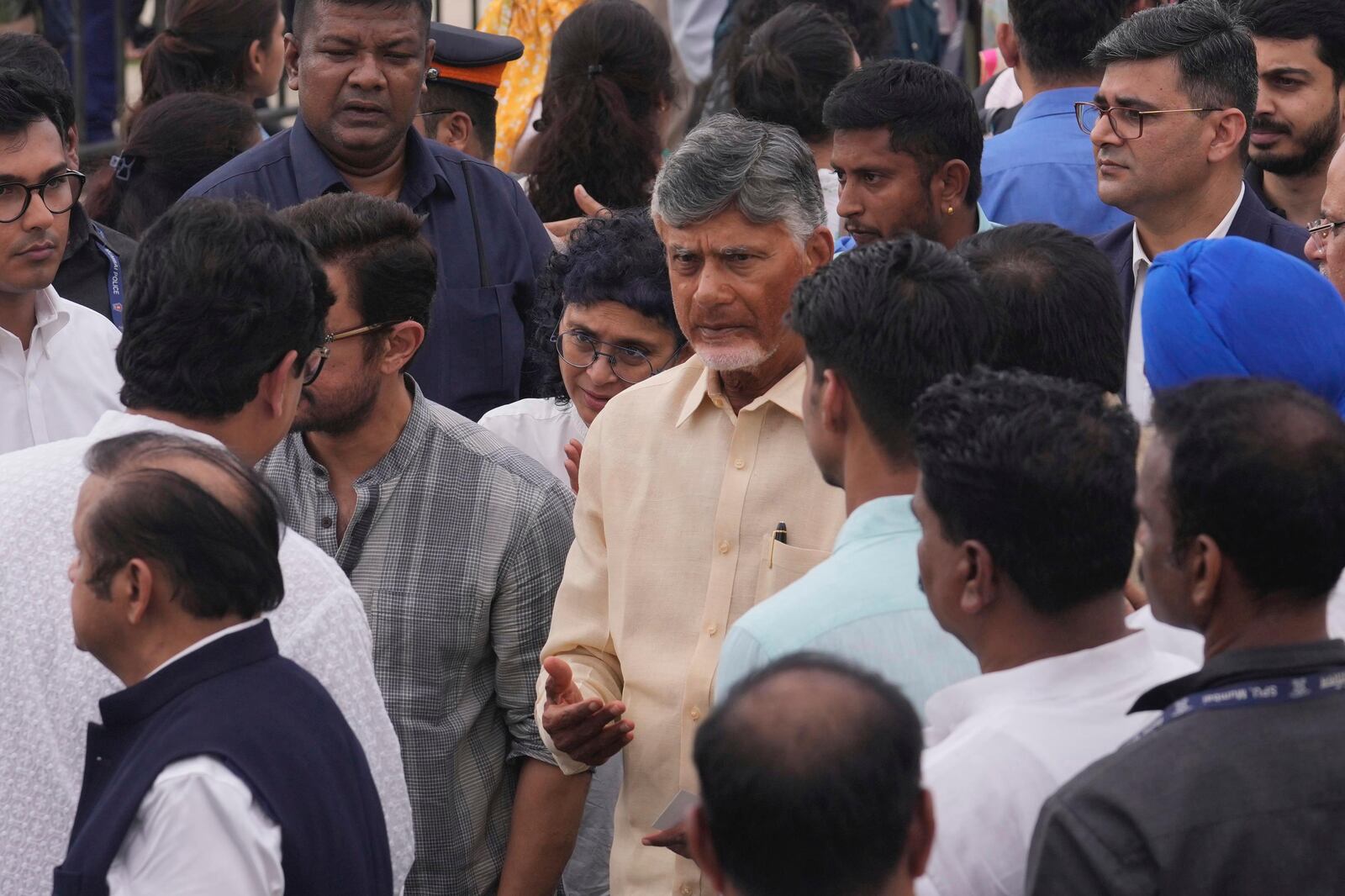 Indian state of Andhra Pradesh Chief Minister N Chandrababu Naidu,center, arrives to pay tributes to Indian business leader Ratan Tata who died on Wednesday night, in Mumbai, India, Thursday, Oct. 10, 2024. (AP Photo /Rafiq Maqbool)