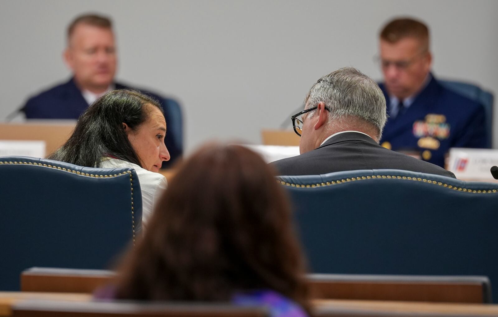 Renata Rojas, OceanGate mission specialist, center left, talks with her legal counsel, center right, during the Titan marine board formal hearing inside the Charleston County Council Chambers, Thursday, Sept. 19, 2024, in North Charleston, S.C. (Corey Connor via AP, Pool)