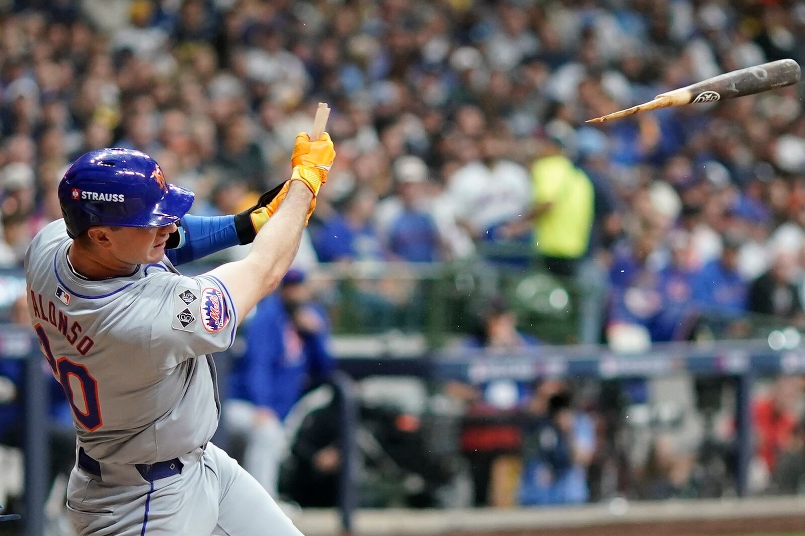 New York Mets' Pete Alonso hits a broken-bat single during the seventh inning of Game 2 of a National League wild card baseball game against the Milwaukee Brewers Wednesday, Oct. 2, 2024, in Milwaukee. (AP Photo/Morry Gash)