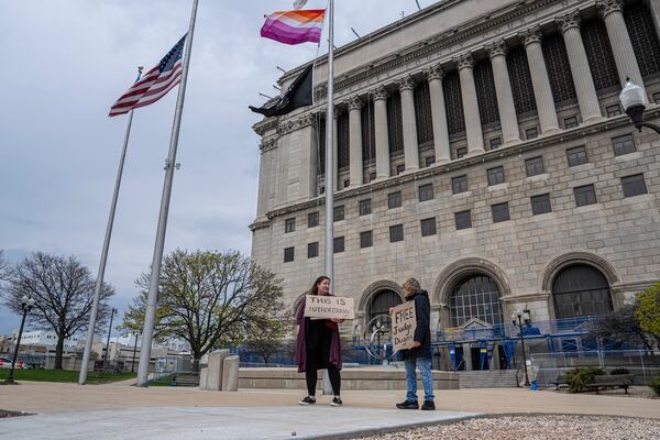 FILE - Protesters stand outside of the Milwaukee County Courthouse, April 25, 2025, in Milwaukee. (AP Photo/Andy Manis, File)