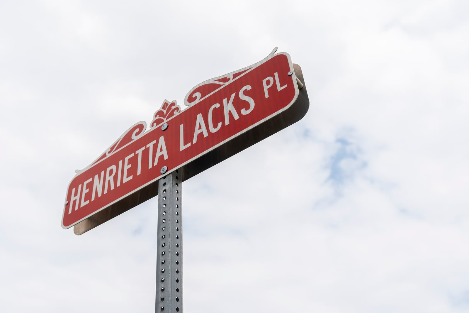 A commemorative street sign in honor of Henrietta Lacks, who lived in Turner Station for almost a decade, is pictured Friday, Aug. 16, 2024, in Turner Station, Md. (AP Photo/Stephanie Scarbrough)