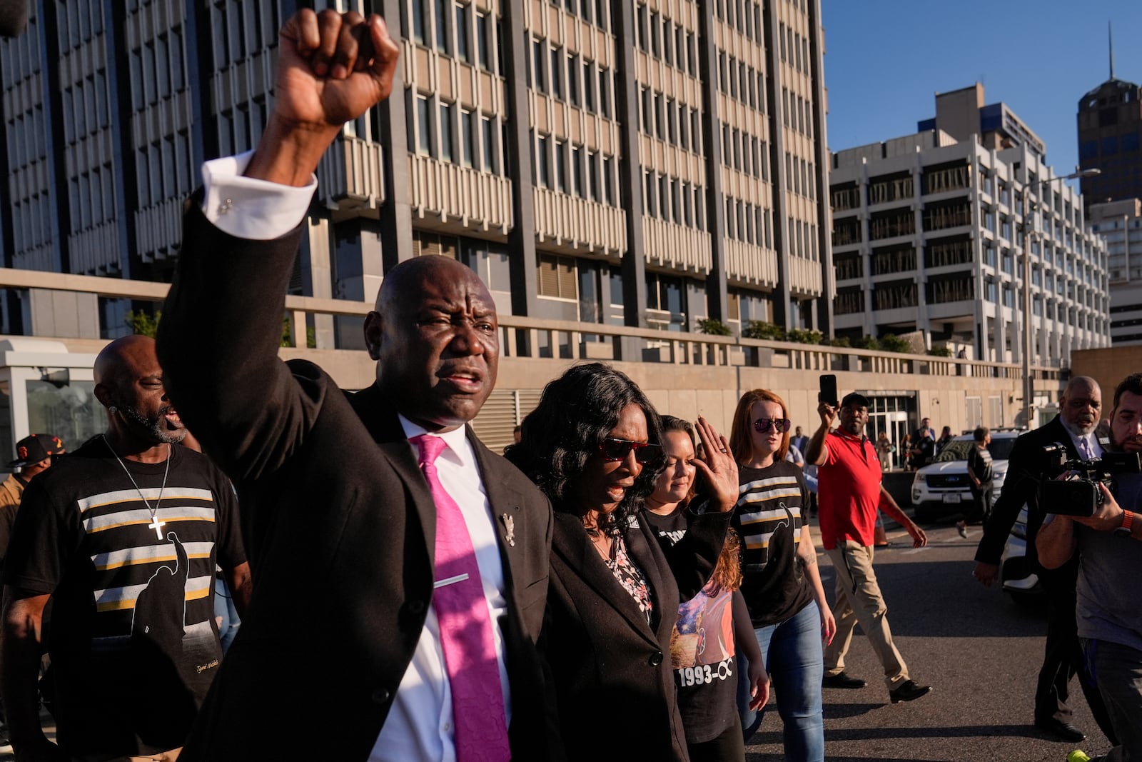 Attorney Ben Crump, left, and RowVaughn Wells, second from left, mother of Tyre Nichols, leave the the federal courthouse after three former Memphis police officers were convicted of witness tampering charges in the 2023 fatal beating of Nichols, Thursday, Oct. 3, 2024, in Memphis, Tenn. (AP Photo/George Walker IV)