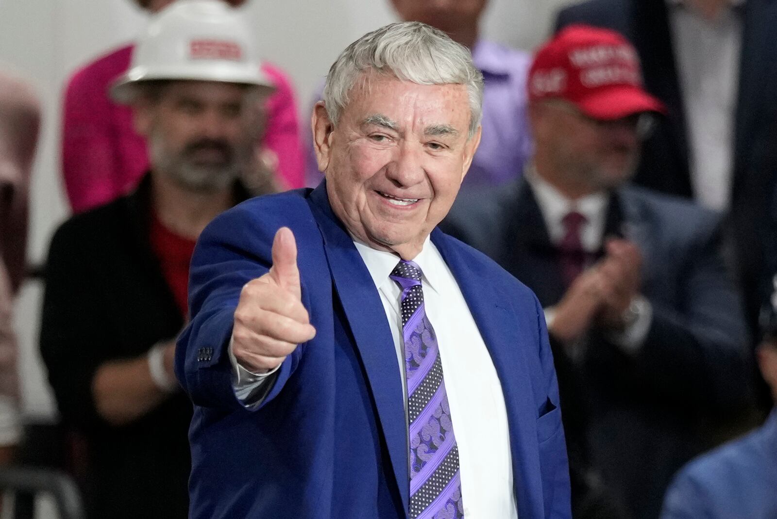 Former Wisconsin Gov. Tommy Thompson arrives before Republican presidential nominee former President Donald Trump at a campaign event at Dane Manufacturing, Tuesday, Oct. 1, 2024, in Waunakee, Wis. (AP Photo/Charlie Neibergall)