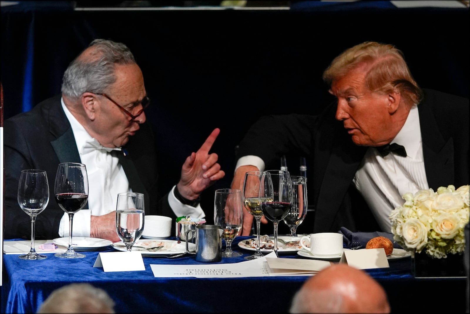 Republican presidential nominee former President Donald Trump atalks with Senate Majority Leader Chuck Schumer of N.Y., at the 79th annual Alfred E. Smith Memorial Foundation Dinner, Thursday, Oct. 17, 2024, in New York. (AP Photo/Julia Demaree Nikhinson)