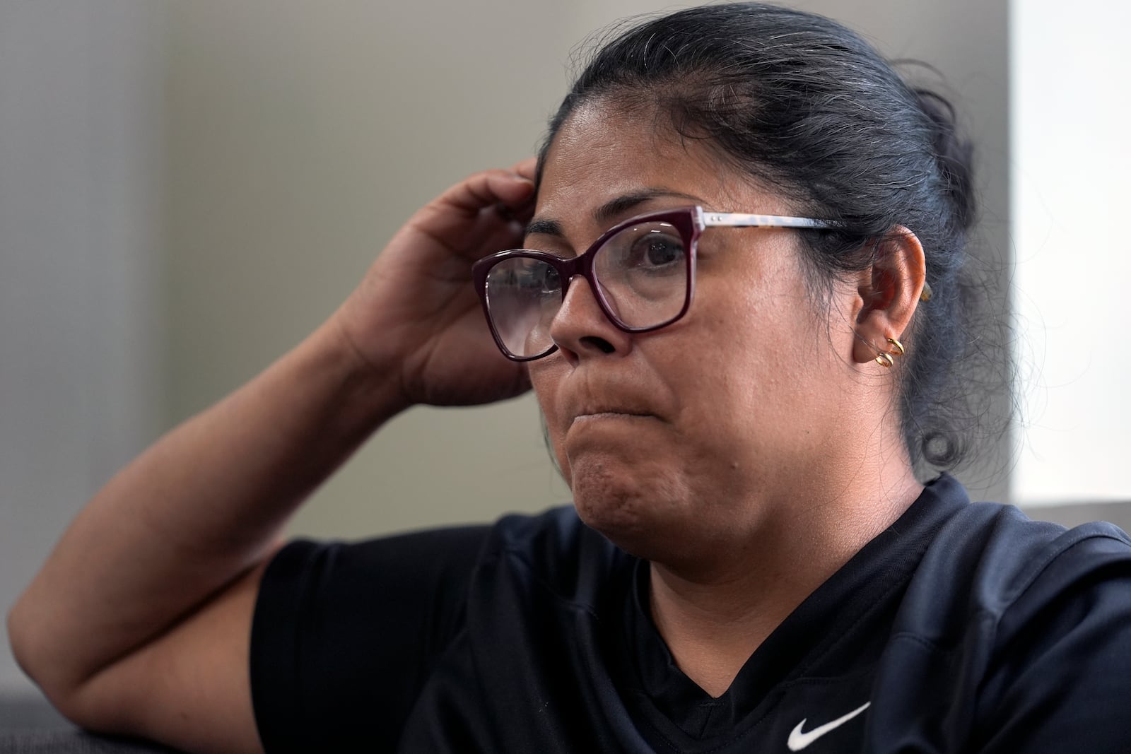 Anabel Andrade speaks about the loss of life at Impact Plastics as a result of flooding during Hurricane Helene Friday, Oct. 4, 2024, in Erwin, Tenn. (AP Photo/Jeff Roberson)