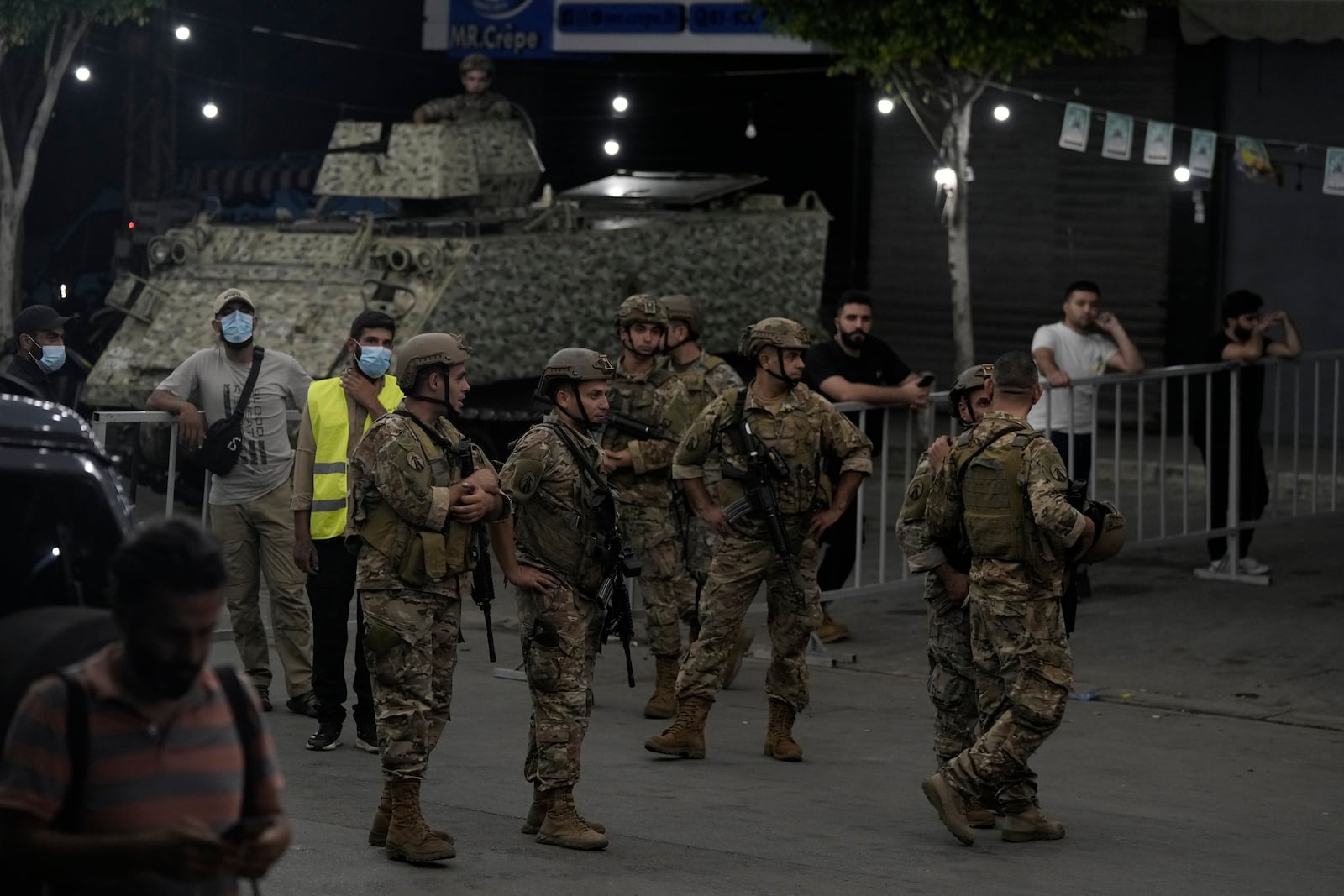 FILE - Lebanese soldiers secure the area near the site of an Israeli airstrike in Beirut's southern suburb, on Sept. 23, 2024. (AP Photo/Bilal Hussein, File)