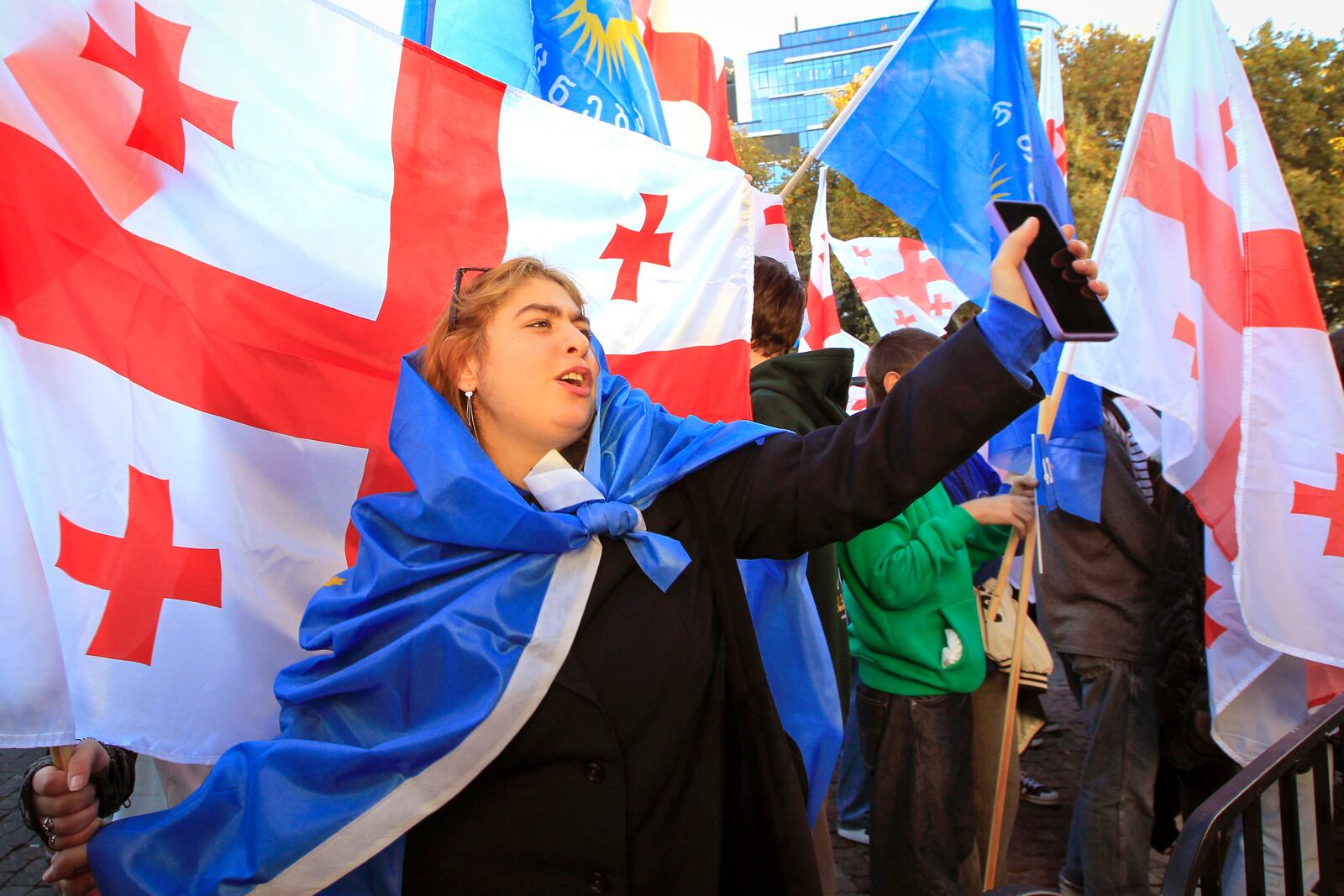 Supporters of the ruling Georgian Dream party attend a rally in the center of Tbilisi, Georgia, Wednesday, Oct. 23, 2024. (AP Photo/Shakh Aivazov)